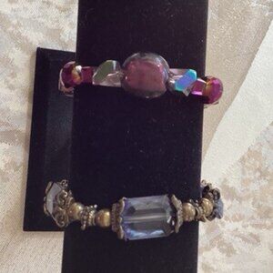 2 handmade beaded bracelets, one purple and one blue